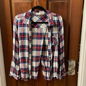 4 flannels in a bundle size medium